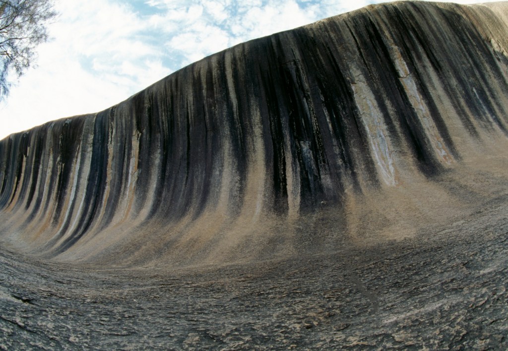Wave Rock, a natural granite rock formation shaped like an ocean wave, in Hyden, Western Australia.