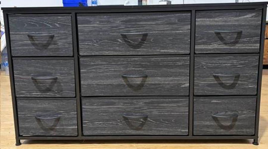 A gray EnHomee 9-drawer fabric dresser.
