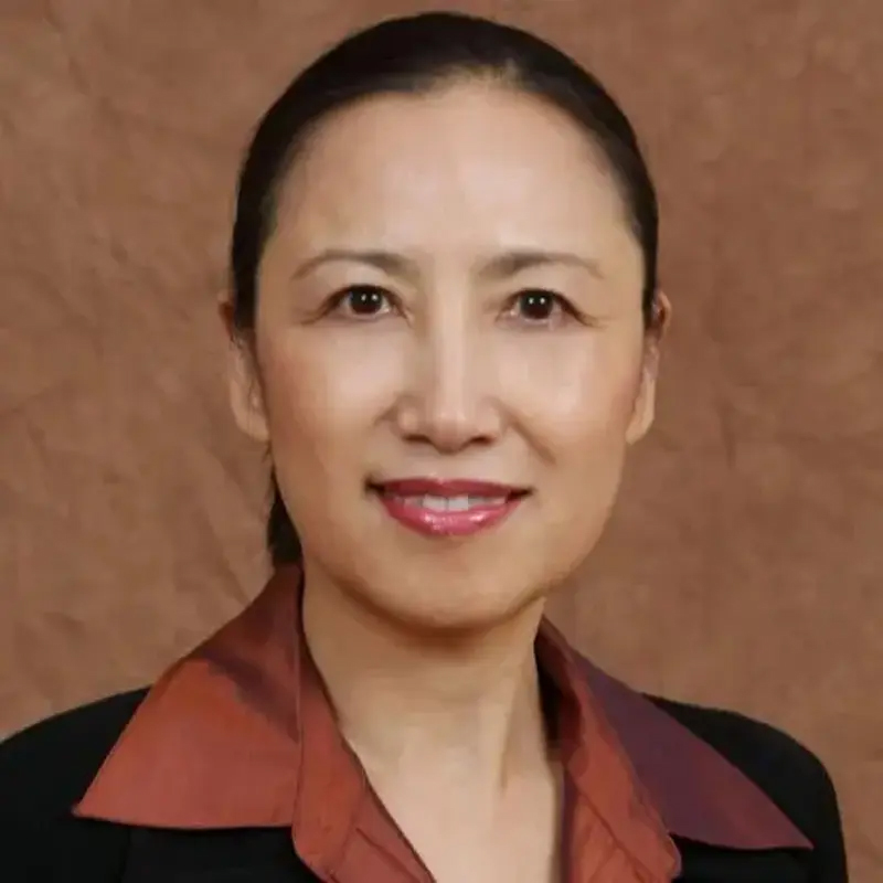Yanping Chen pictured against a brown background.