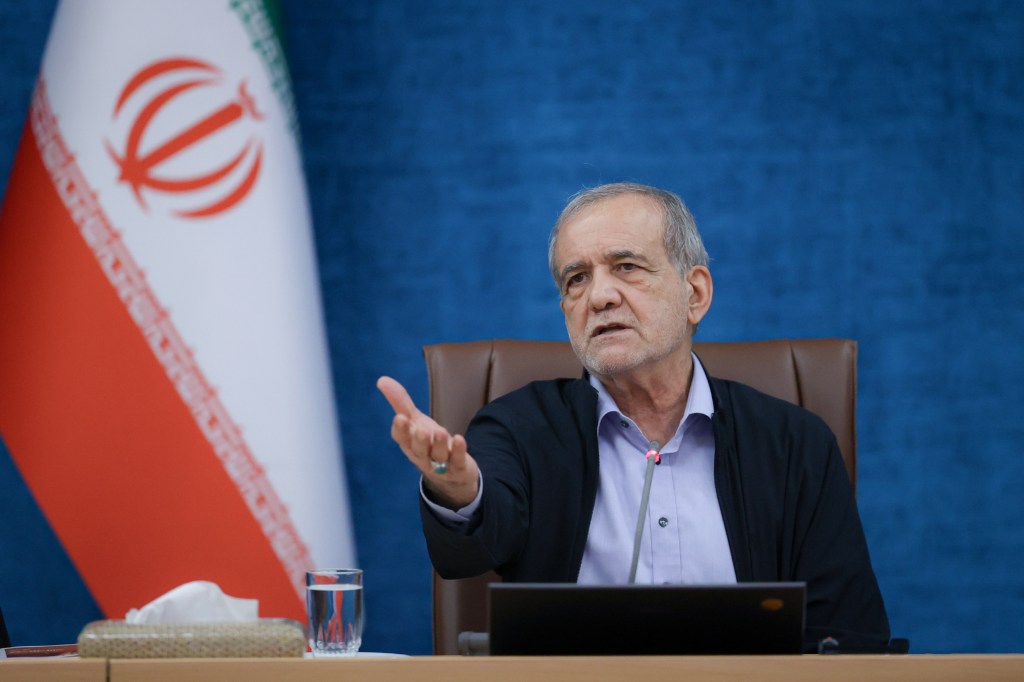 Iranian President Masoud Pezeshkian giving a speech.