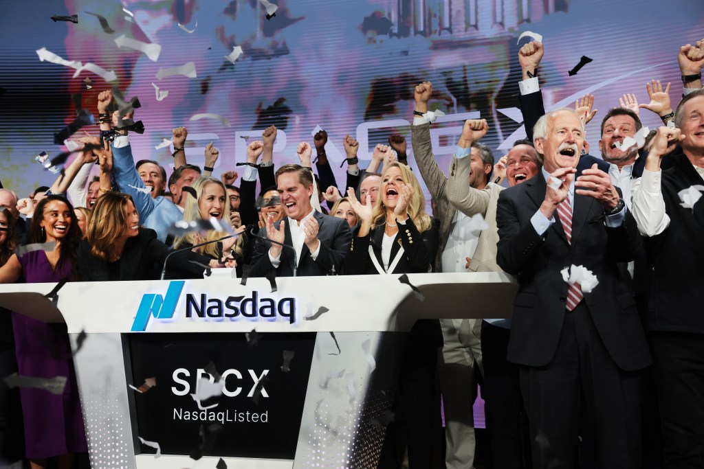 SpaceX President Gwynne Shotwell and employees celebrate their IPO on the Nasdaq at Times Square.
