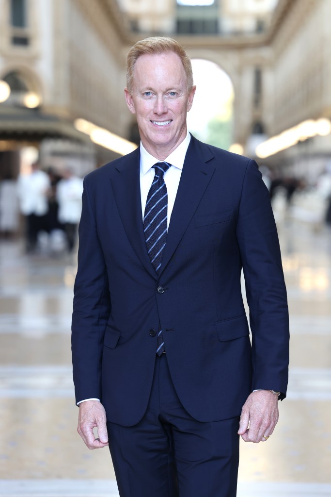 Roger Lynch wearing a dark suit and tie at Vogue World: Milano.