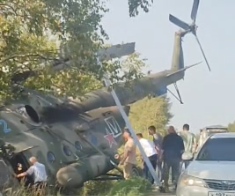 A Russian Mi-8 military transport helicopter crashed and rolled into a ditch on Sakhalin Island.