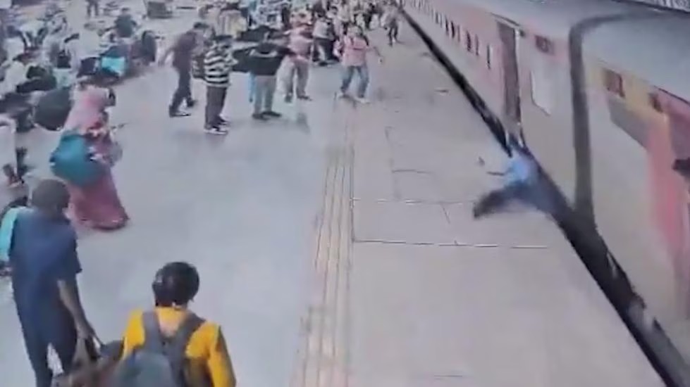 A man getting dragged 50 meters by a moving train after getting stuck between the train and platform.