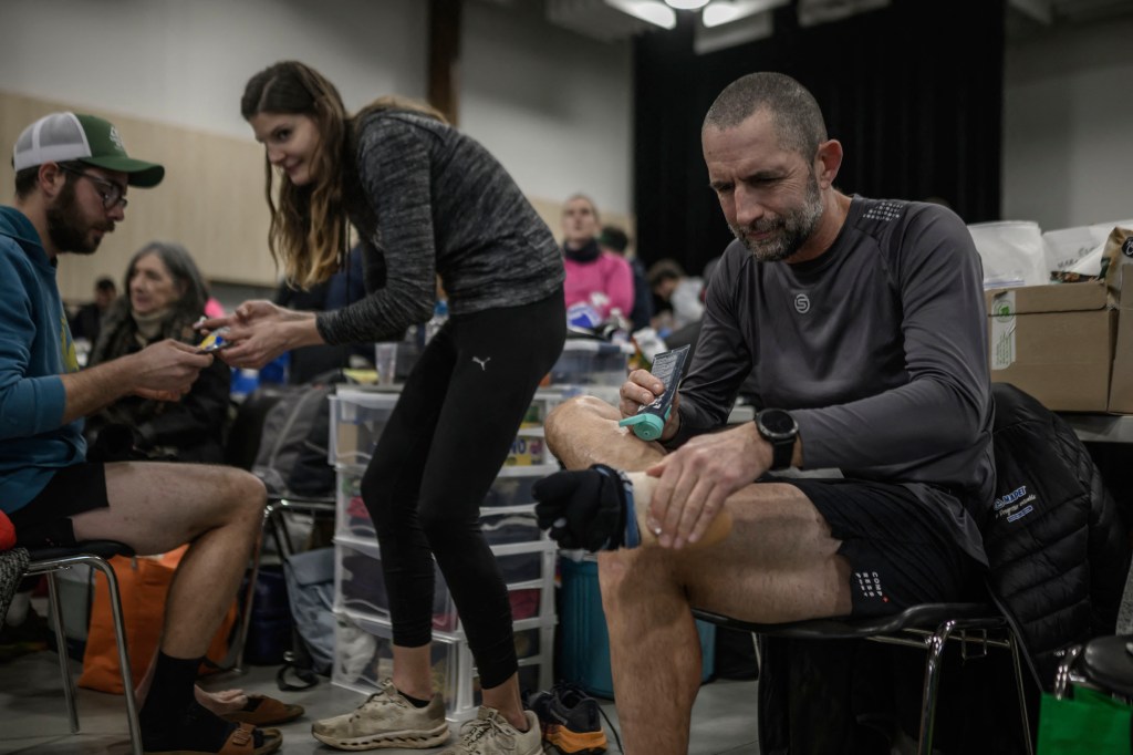 Competitors prepare for the Backyard Toulouse ultra-endurance race.
