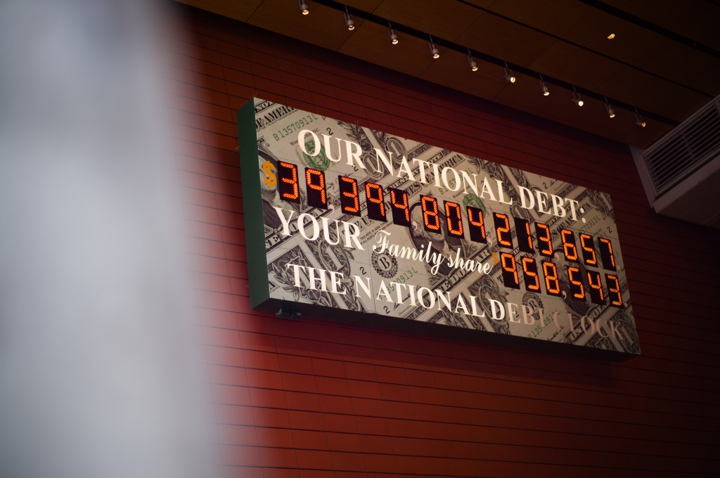 The National Debt Clock displaying total U.S. public debt surpassing $40 trillion.