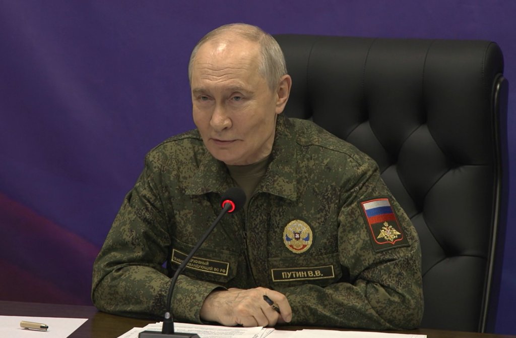 Russian President Vladimir Putin speaks during a visit to a command post.