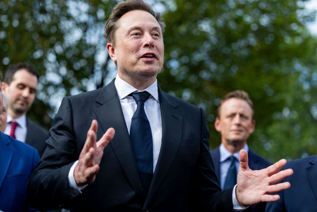 Elon Musk speaks outside the West Wing of the White House.